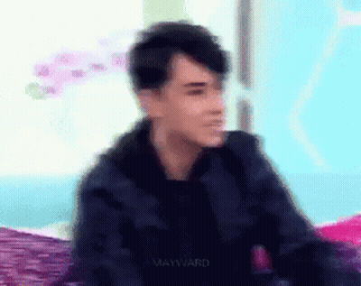 Blurry Man Sitting On Bed With Mayward GIF