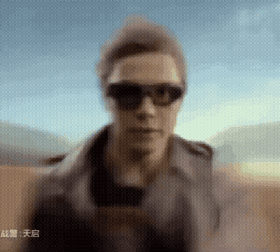 Blurry Man Wearing Sunglasses And Hat GIF