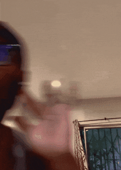 Blurry Man Wearing Sunglasses GIF