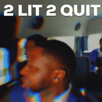 Blurry Man With 2 Lit 2 Quit Behind Him GIF