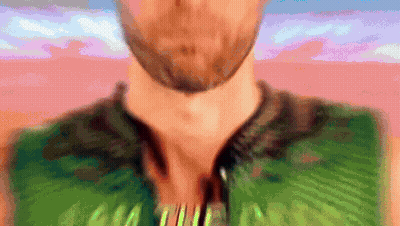 Blurry Man With Beard In Green Shirt Saying AA GIF