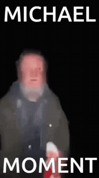 Blurry Man With Beard Saying Michael Moment GIF
