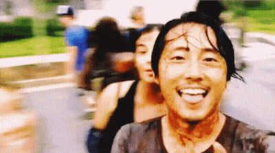 Blurry Man With Blood On Face Smiling GIF