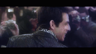 Blurry Man With Camera Behind GIF