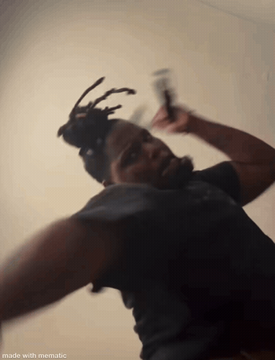 Blurry Man With Dreadlocks And Beard Made With Mematic GIF