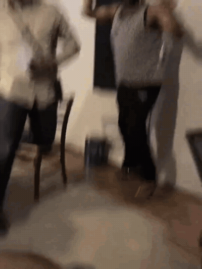 Blurry People Dancing In A Room GIF