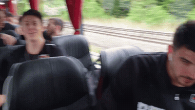 Blurry People On Bus With Adidas Shirt GIF