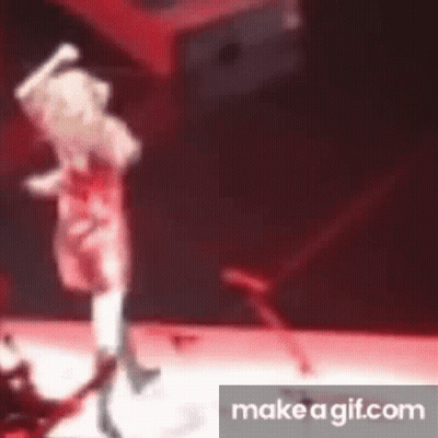 Blurry Person Dancing On Stage GIF