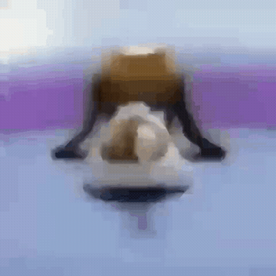 Blurry Person Doing Yoga Pose On Purple GIF