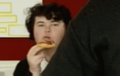 Blurry Person Eating Sandwich GIF