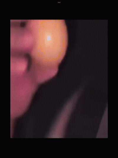 Blurry Person Face And Candle GIF