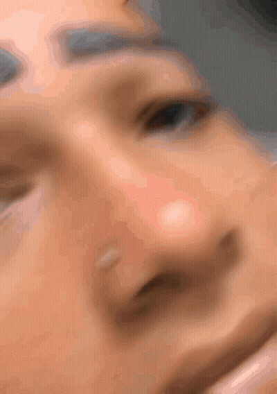 Blurry Person Face With Eyes Closed GIF