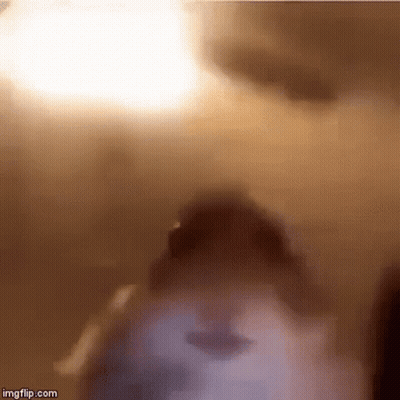 Blurry Person Face With Light Behind GIF