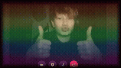 Blurry Person Giving Peace Sign GIF