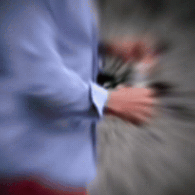 Blurry Person Holding Camera GIF