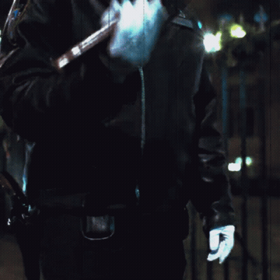 Blurry Person Holding Railing At Night GIF