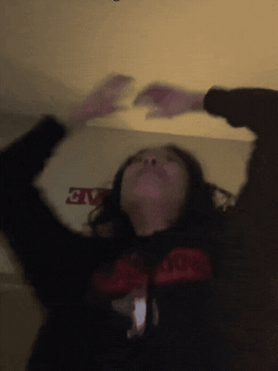Blurry Person In Black Shirt With Evo GIF