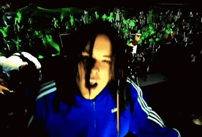 Blurry Person In Blue Jacket GIF