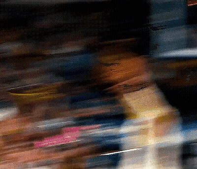 Blurry Person In Dark Room With I Love You Sign GIF