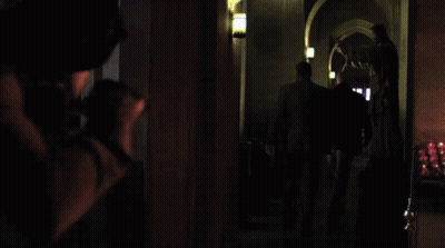Blurry Person In Dark Room With Purple Light GIF