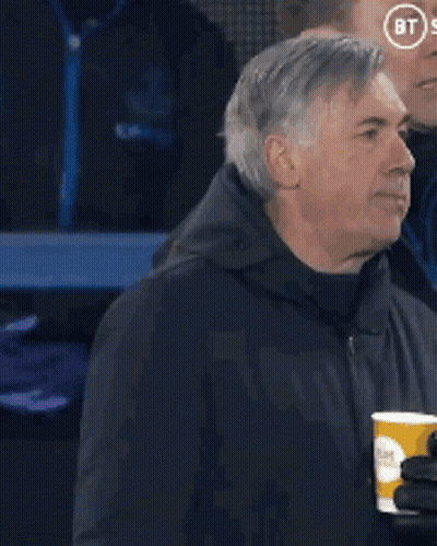 Blurry Person In Front Of BT Logo GIF