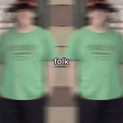 Blurry Person In Green Folk Shirt GIF