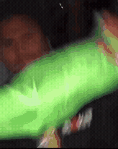 Blurry Person In Green Shirt Saying A GIF