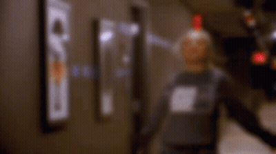 Blurry Person In Hallway GIF