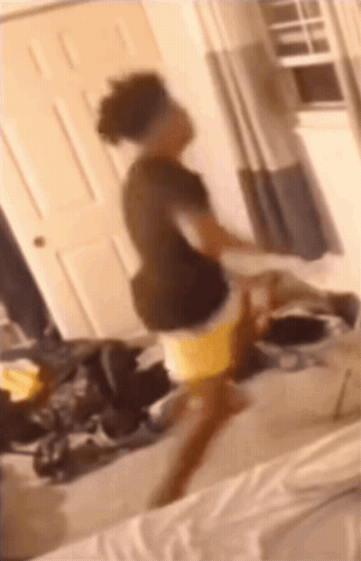 Blurry Person In Messy Room GIF