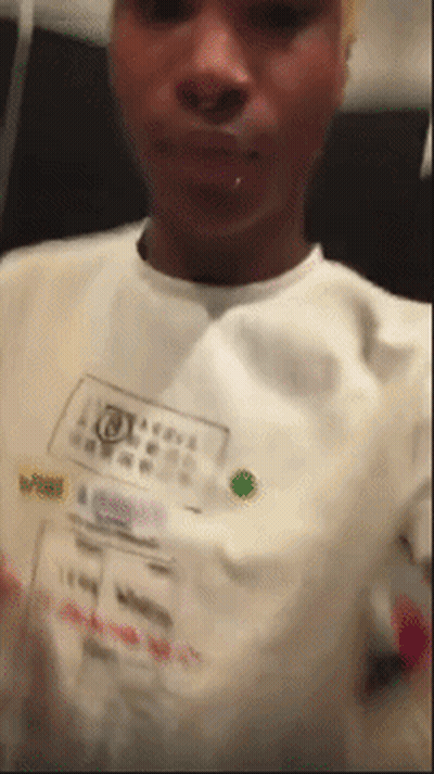 Blurry Person In White Abercrombie & Fitch Shirt GIF