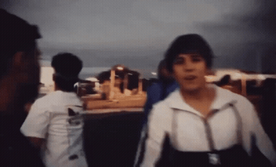Blurry Person In White Jacket With Adidas GIF