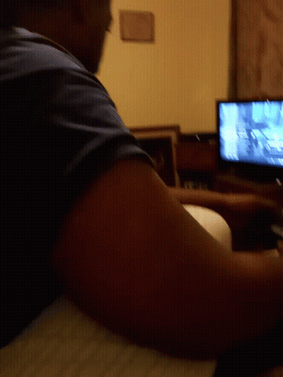 Blurry Person Looking At Television GIF