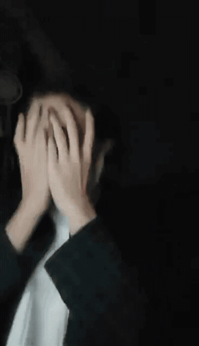 Blurry Person Making Funny Face Behind Glass Door GIF