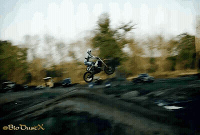 Blurry Person On Dirt Bike Bio Dust X GIF