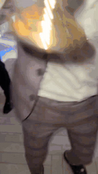Blurry Person Pants And White Shirt GIF