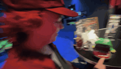 Blurry Person Playing Game GIF