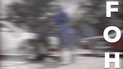 Blurry Person Riding Bike With F O H Visible GIF