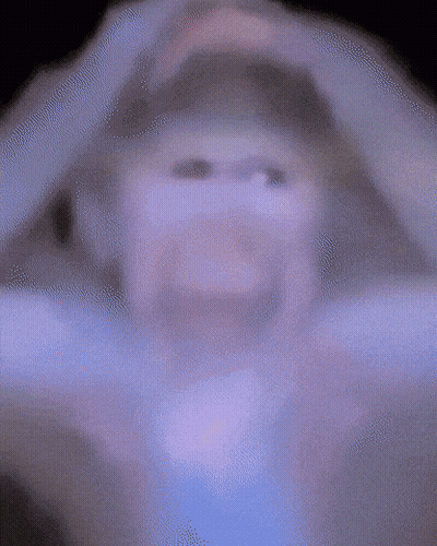 Blurry Person's Face Purple Background GIF