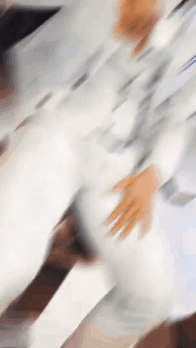 Blurry Person's Hands On Table GIF