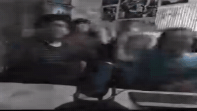 Blurry Person Sitting In Chair GIF