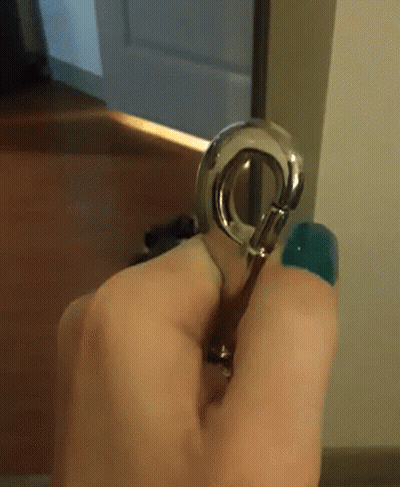 Blurry Person Sitting On Bed With Remote Control GIF