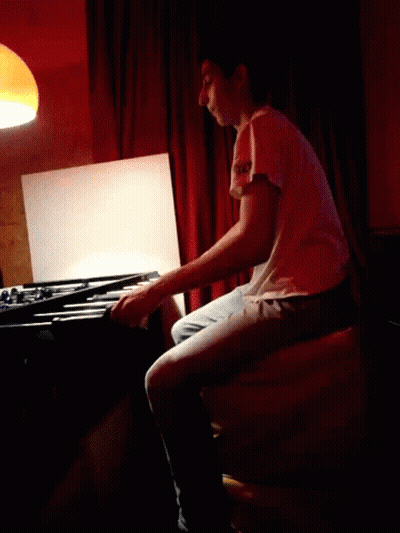 Blurry Person Sitting On Chair GIF
