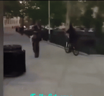 Blurry Person Walking Down Sidewalk A Few Steps GIF