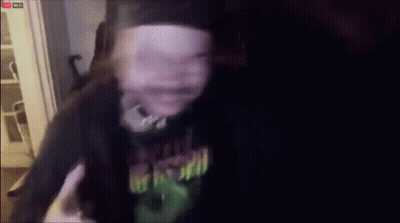 Blurry Person Wearing Freak Out Shirt GIF