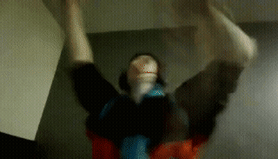 Blurry Person With Arms Up GIF