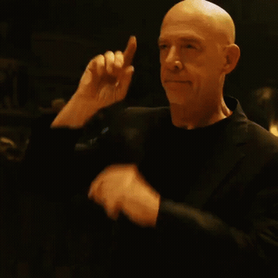 Blurry Person With Beard And White Hat GIF