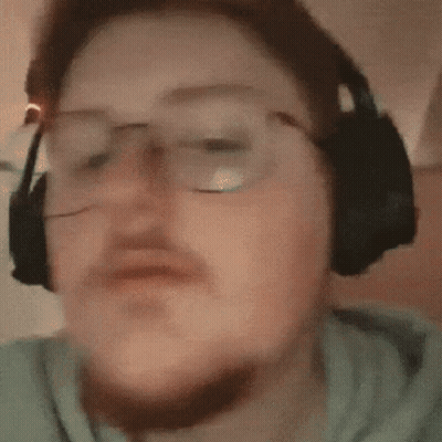 Blurry Person With Glasses GIF