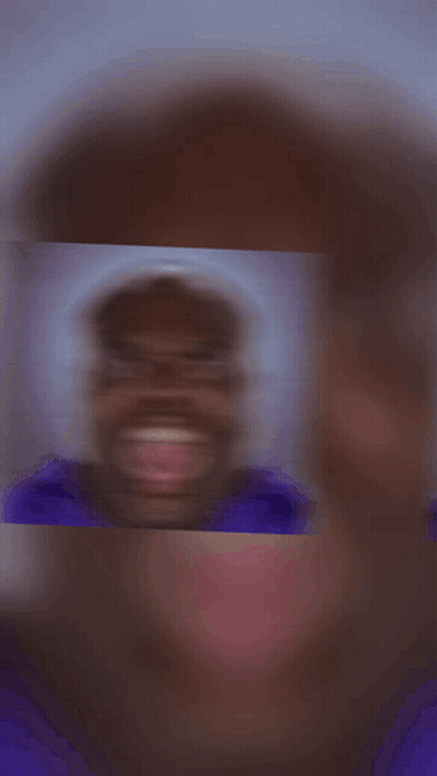 Blurry Person With Hearts Around Them GIF