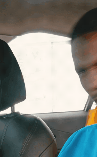Blurry Photo Of Man In Car GIF