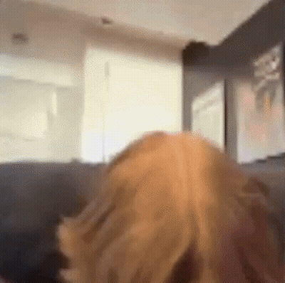 Blurry Photo Of Person On Couch GIF